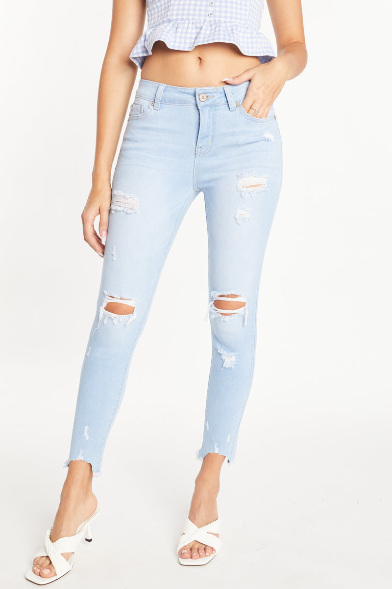 Distressed mid store rise skinny jeans