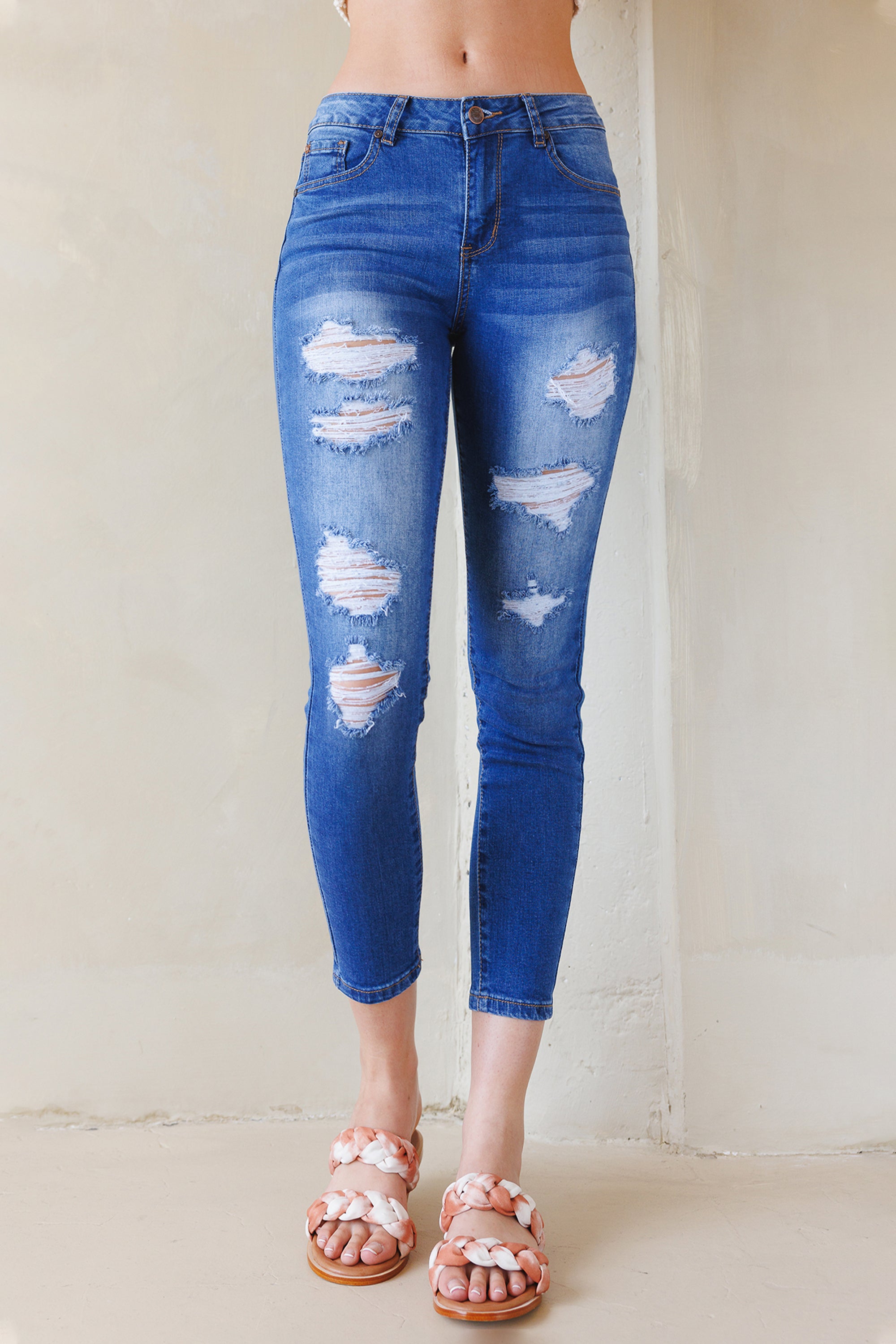 Dark blue ripped orders skinny jeans womens