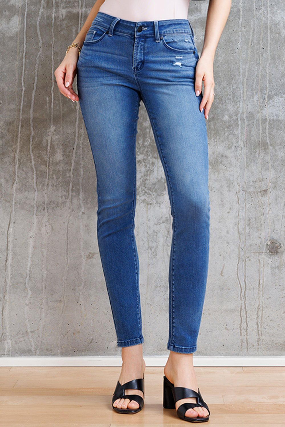 Mid Rise Destructed Skinny Jeans